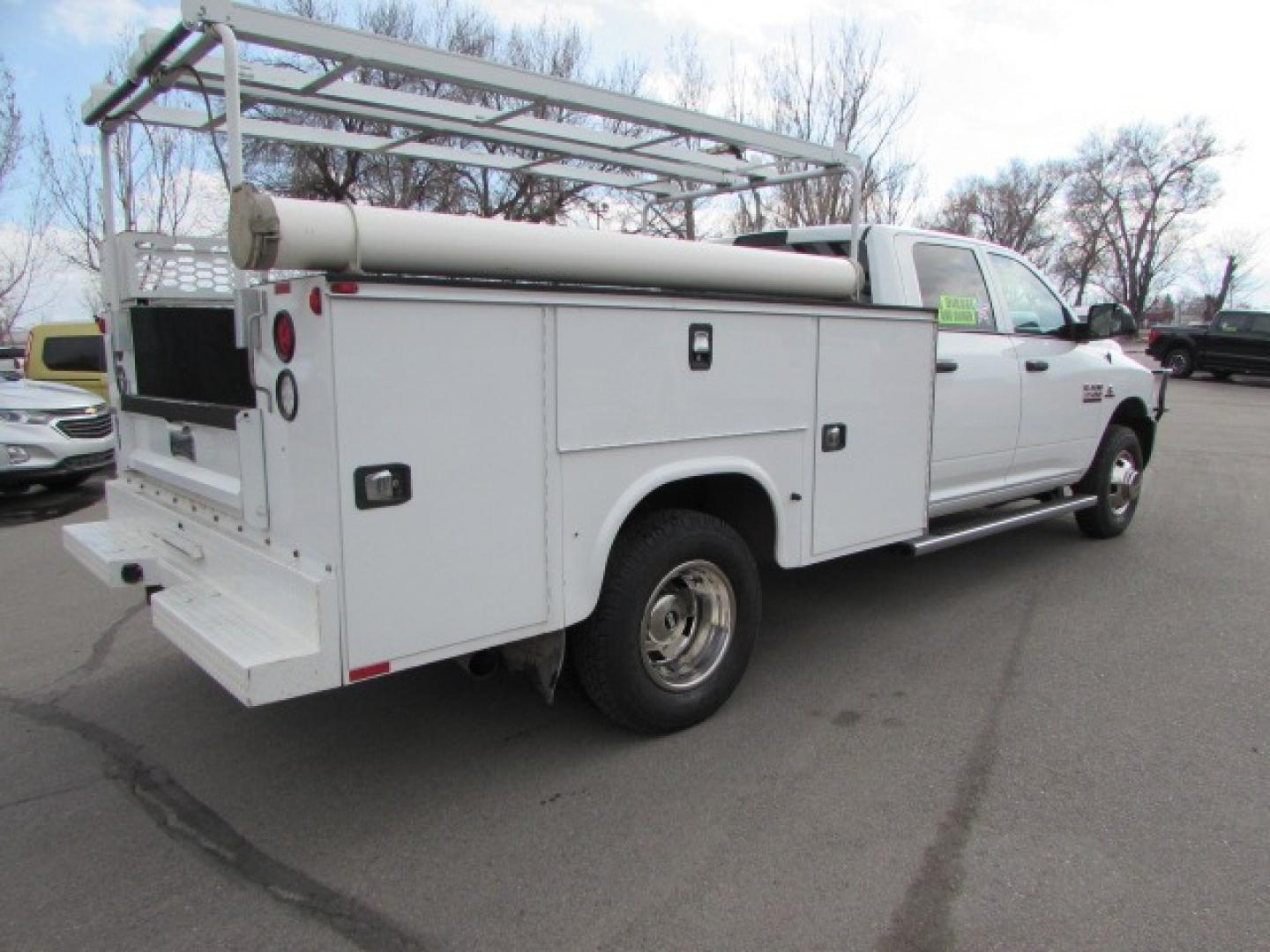 2018 White /Gray RAM 3500 Service Body Crew Cab 4WD (3C7WRTCL2JG) with an 6.7 I6 Cummins Turbo Diesel engine, Automatic transmission transmission, located at 4562 State Avenue, Billings, MT, 59101, (406) 896-9833, 45.769516, -108.526772 - Photo#4